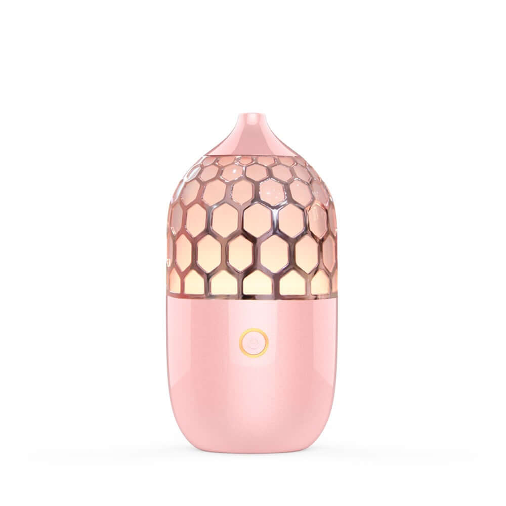 Future Tech Asakusa Pink Aroma Diffuser on a pink background, showcasing its elegant design and aromatherapy function.