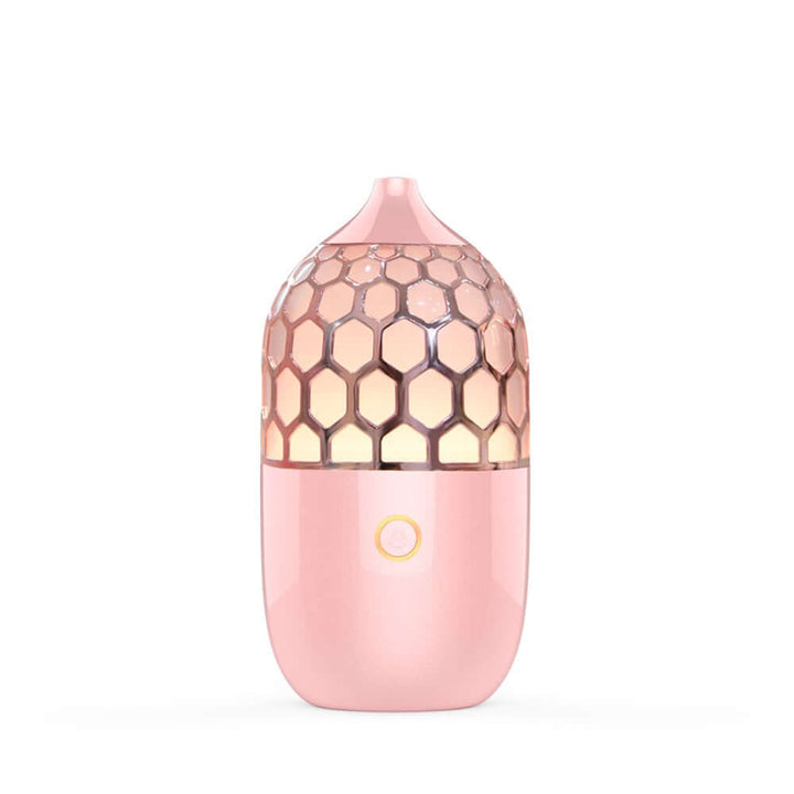 Future Tech Asakusa Pink Aroma Diffuser on a pink background, showcasing its elegant design and aromatherapy function.