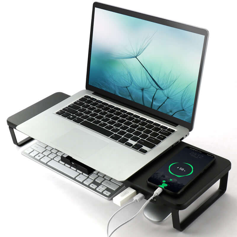 Future Tech Monitor lift stand laptop stand with charging paired with a laptop and smartphone on a sleek desk setup.